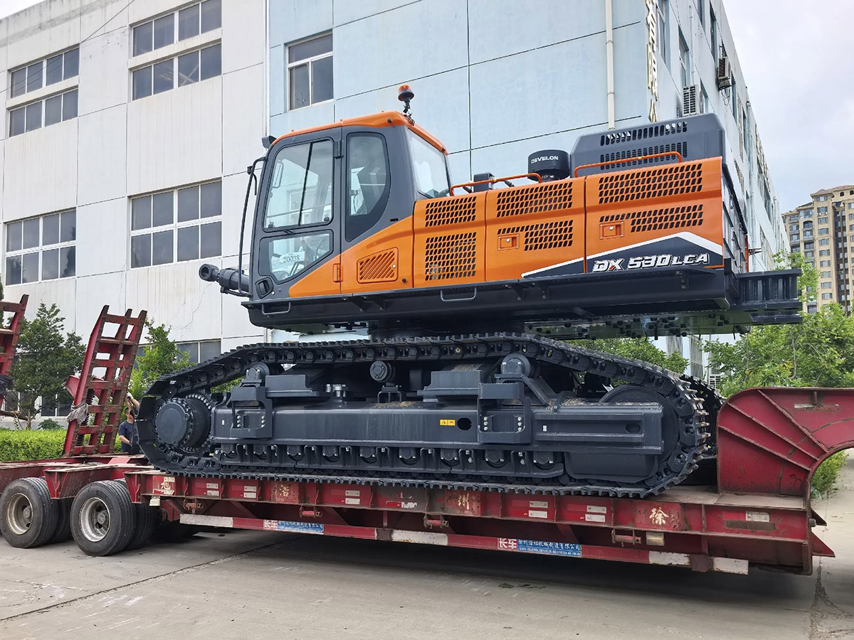 Excavator loading and shipping.