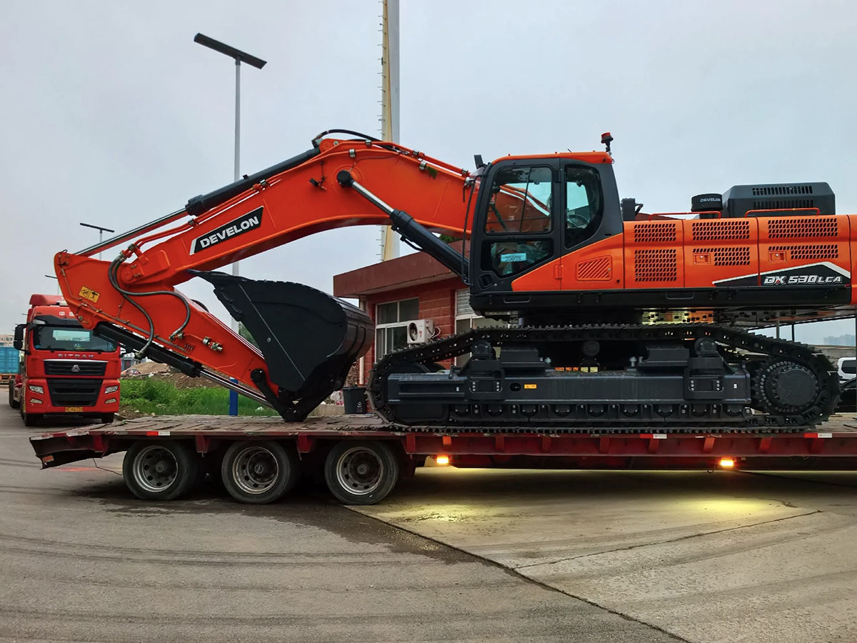 Excavator loading and shipping.